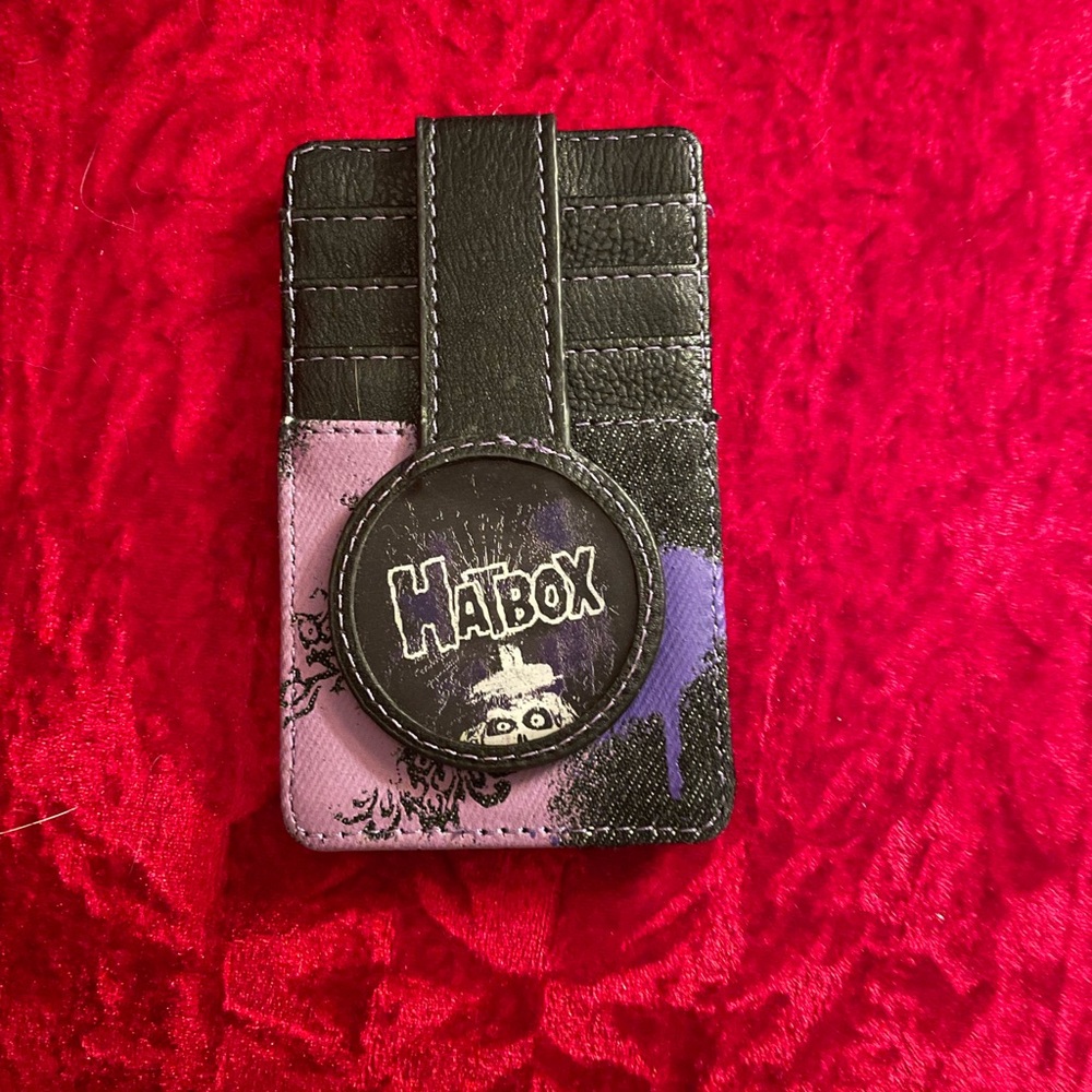 Disney’s haunted mansion, credit card holder and ID holder. Never used no tag.